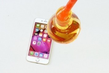 iPhone 6S'in üzerine erimiş cam döktüler